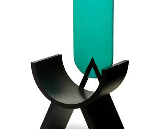 1233
Late 20th century
A Memphis Milano-style postmodern lounge chair
Appears unmarked
With black enameled plywood half-circle seat and turquoise lacquered backrest raised on a V-shaped base
53.5" H x 26.25" W x 17.5" D
Estimate: $500 - $700