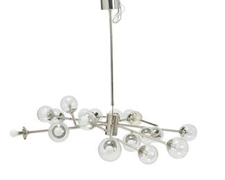 1093
Early 21st century
A Modern glass globe chandelier
The eighteen-light chandelier with polished steel frame issuing six articulated branching arms terminating in clear blown glass globes, electrified
33" H x 59" Dia.
Estimate: $500 - $700