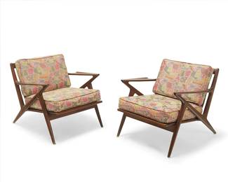 1290
Poul Jensen (b. 1922-n.d.)
A pair of "Z-chairs" for Selig, 1950s/60s; Denmark
Designed 1957
The Z-form angular wood armchairs, each featuring bent slatted back and burlap webbing, with later polychrome fabric upholstered seat and back cushions
2 pieces
Each: 28" H x 29.75" W x 32" D
Estimate: $600 - $800