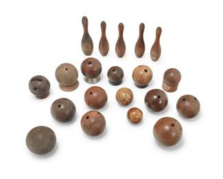 1293
Late 19th/early 20th century
A collection of wood bowling balls and pins
Some variously marked or numbered
Comprising fifteen bowling balls in various sizes and styles, five of them set on wood or metal stands, and five bowling pins set on black-painted wood block stands
20 pieces
Largest ball: 9.5" Dia.; Smallest ball: 5.75" Dia.; Tallest pin: 18.5" H; Shortest pin: 16.75" H
Estimate: $300 - $500