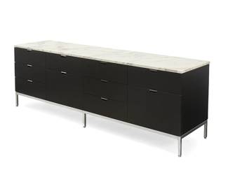 1081
Florence Knoll (1917-2019)
A credenza for Knoll Studio, early 21st century
Designed 1961
Impressed to one leg: Knoll Studio / Florence Knoll
The enameled wood credenza with ten drawers, set on a chromed metal frame and surmounted by a white marble top
25.5" H x 75" W x 18.25" D
Estimate: $1,200 - $1,800