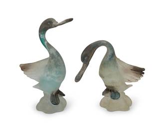 1157
1982
Two Cenedese Murano art glass duck figures
Each etched to underside: Cenedese / Murano / 1982
The scavo glass figures, each with antiquing
2 pieces
Taller: 13.75" H x 7" W x 8" D; Shorter: 10.5" H x 6.75" W x 9.75" D
Estimate: $200 - $400