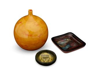 1316
Polia & William Pillin (1909-1992 and 1910-1985)
Three glazed studio pottery vessels, mid-20th century
Each signed to underside: Pillin; vase further marked: W + P [William Pillin threw and Polia glazed]
Comprising a yellow-glazed rounded vase, a small squared dish depicting cats, and a smaller round dish depicting a female face
3 pieces
Largest: 9" H x 7" Dia.; Smallest: 1.375" H x 3.875" Dia.
Estimate: $400 - $600