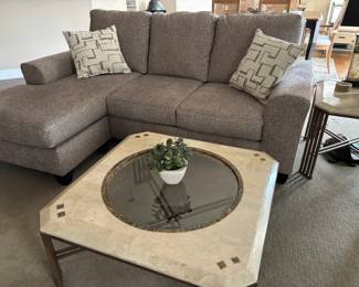 Coffee table has a matching sofa table and side table to fit into a neutral decor home. Note chaise is on the left.