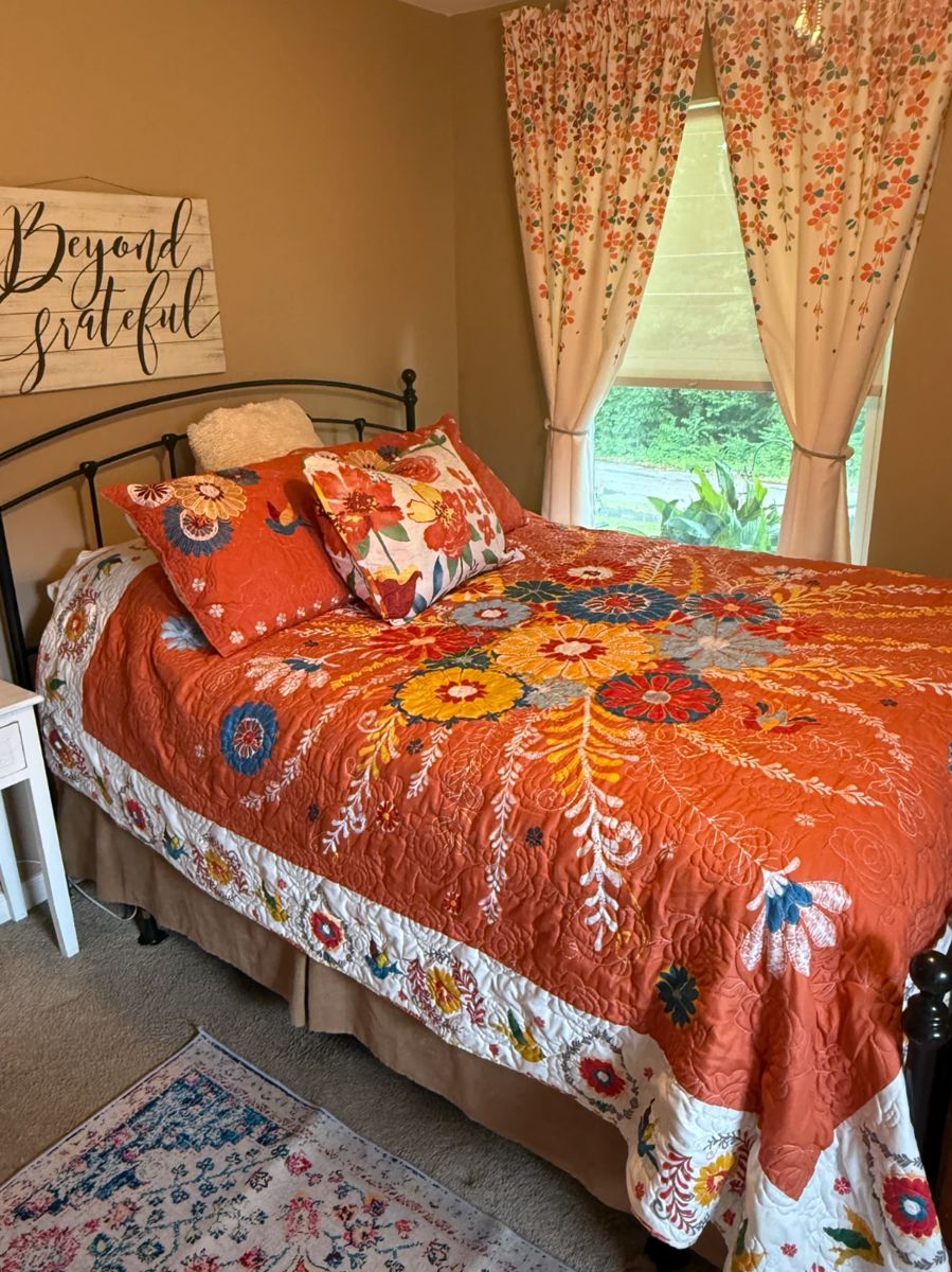 Queen size wrought iron bedframe with new pillowtop mattress set and matching comforter and curtains