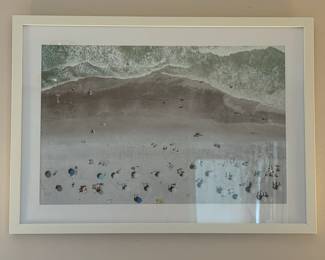 Framed aerial photograph of beachgoers