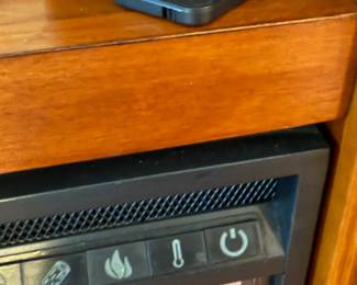 Detail of fireplace controls and remote