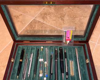 Parker IM Charcoal Gray Fountain Pen, Montefiore Mechanical Pencil Blk/Gold, Lamy Ballpoint Pen,
Space Pen By Fisher Bullet Pen USA, Parker Ballpoint Pen Blk. Cross Matte Blk/Gold Pen, Collectible Pen Storage Box!