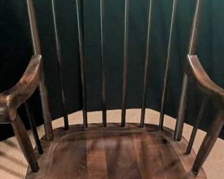 Vintage Wooden Spindle Back Rocking Chair with Floral Detail and Handmade Quilt