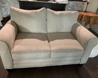 Beige love seat
