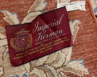 Persian rug tag. 100% wool made by hand.