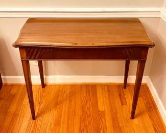 Flip-top game/console/dining table with 3 additional leaves...extends to 6 feet (detail).