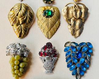 Large collection of antique and vintage clips...