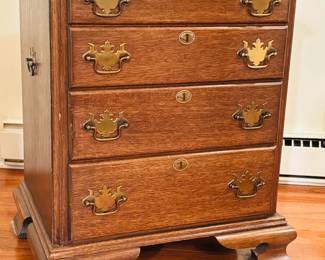 Miniature chest in dark oak finish...