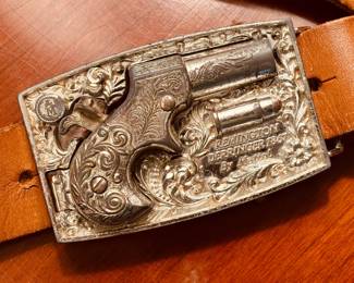 From a time when all double-naught spies bought their secret Derringer belt buckles from Mattel!!