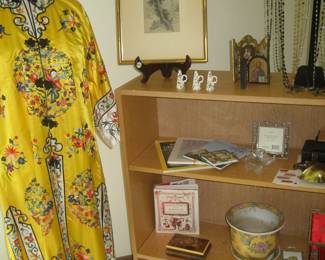 Japanese embroidered silk kimono, shelf unit, and decorative pot