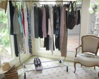 Women's clothing (size 12) labels include St. John, Chicos, and Athleta, totes and straw hats