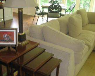 Upholstered sectional, nesting tables, table lamp, card table