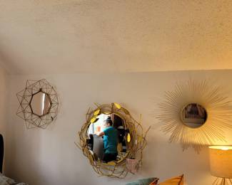 Beautiful Mirrors catching beautiful staff at work
