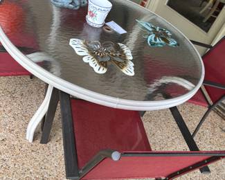 Glass patio table w/4 chairs