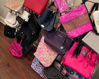 Name brand purses by Michael Kors, Kate Spade, Vera Bradley, Coach and more