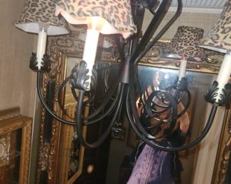 Leopard print lamp shades, cast iron chandelier.   $100