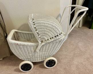 Vintage wicker babydoll pram