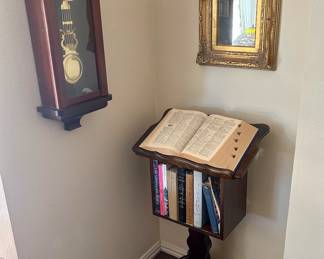 Antique dictionary, stand, and Churchill Clockworks wall clock