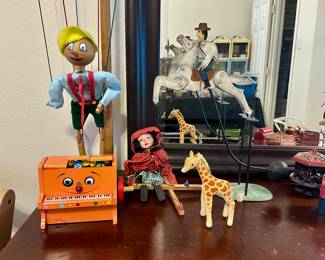 Vintage marionettes, Steiff giraffe, etc