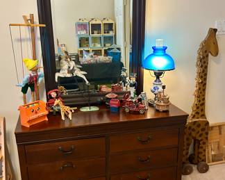 Nice collection of vintage toys and a nice dresser with mirror
