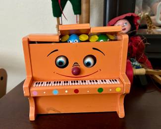 This sweet vintage musical toy with moving eyes and peeping mice