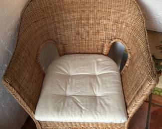 Rattan chair with cushioned seat