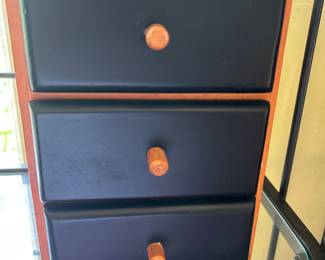 Small wooden cabinet with three drawers