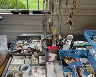 Maybe 5 at table at one time - thank you
Some Sterling - NO GOLD - Mostly Costume jewelry Lots of Pins And Brooches