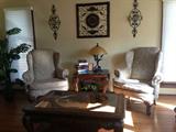 2 Karpen wingback chairs, end table, coffee table, lamp, wall art, and custom window shades