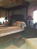 Fabulous 4 poster West Indies Collection American Signature king size bed, right stair steps, and 2 matching night stands,  lamps, and custom drapery treatments