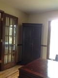 Corner of desk, and office armoire