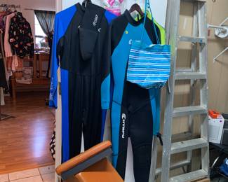 Wetsuits, ladders, ottoman