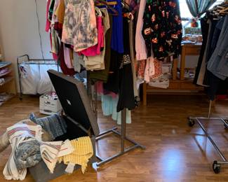 MORE CLOTHES! Tshirts, pjs, sports shorts and more . Ottoman is for sale and is also full of rugs for sale
