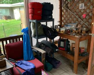 Planters bench, a whole outside patio set, tents, inflatable mattresses, hardware and all kinds of miscellaneous pots, etc.