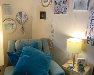 Manual recliner armchair, wall art and side table