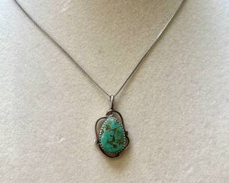 ,925 Navajo Pendant, signed.  Sterling silver chain
