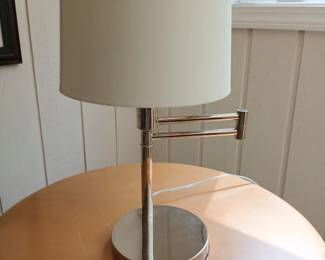 Designer swivel arm lamp