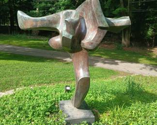 3 different angles of a Bronze sculpture by Seymour Rosenwasser