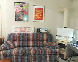 Vintage sleeper sofa.  And art.   Also - high quality mat cutter for framing.