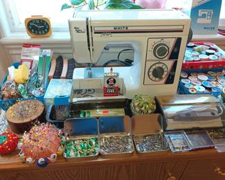 White sewing machine and accessories