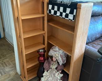 Books shelves and china doll