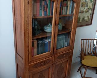 Vintage store cabinet with glass doors