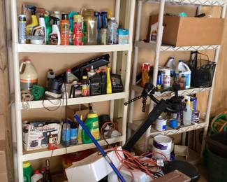 Large White Shelves with Cleaning Supplies