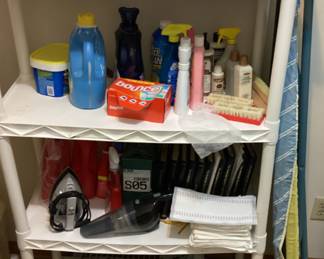 Small White Shelf with Cleaning Supplies